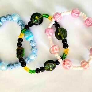 Lot of 3 bracelets Stretchy Approx 7.5" - 8" Green pink blue Discount Shipping!!